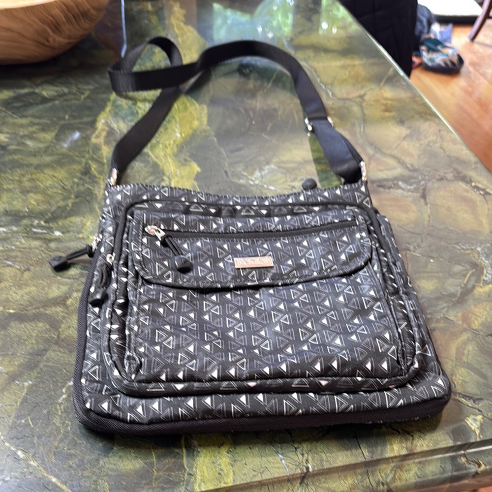 E.T.A. Travel Crossbody Bag Adjustable Strap & Expandable Width Capacity